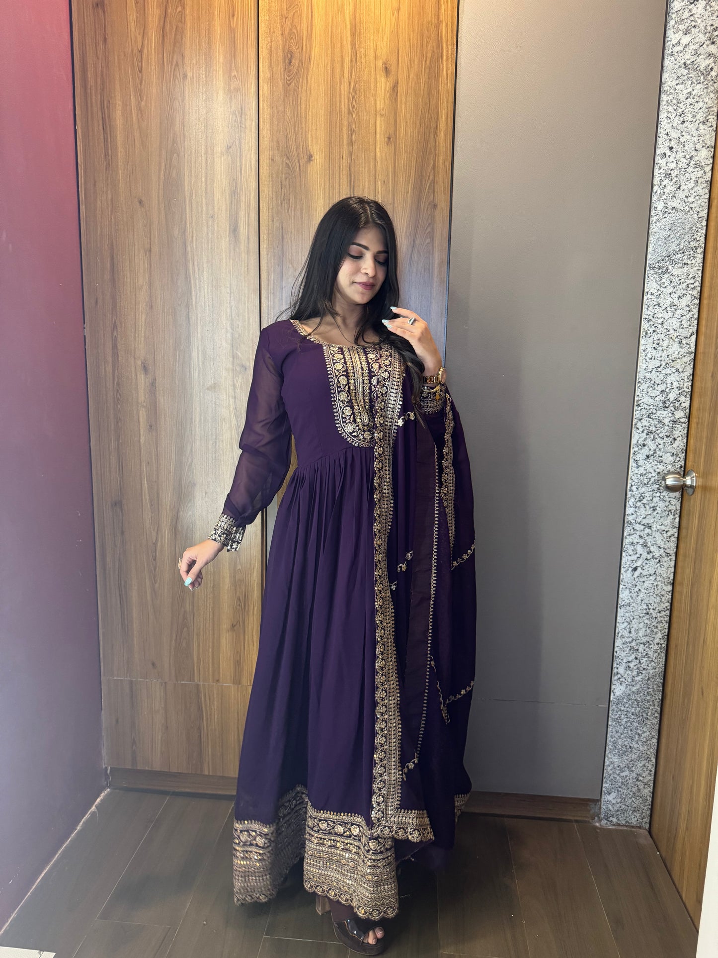 VISHWA PANDYA IN PURPLE COLOR FAUX BLOOMING RICH SEQUENCE EMBROIDERED GOWN