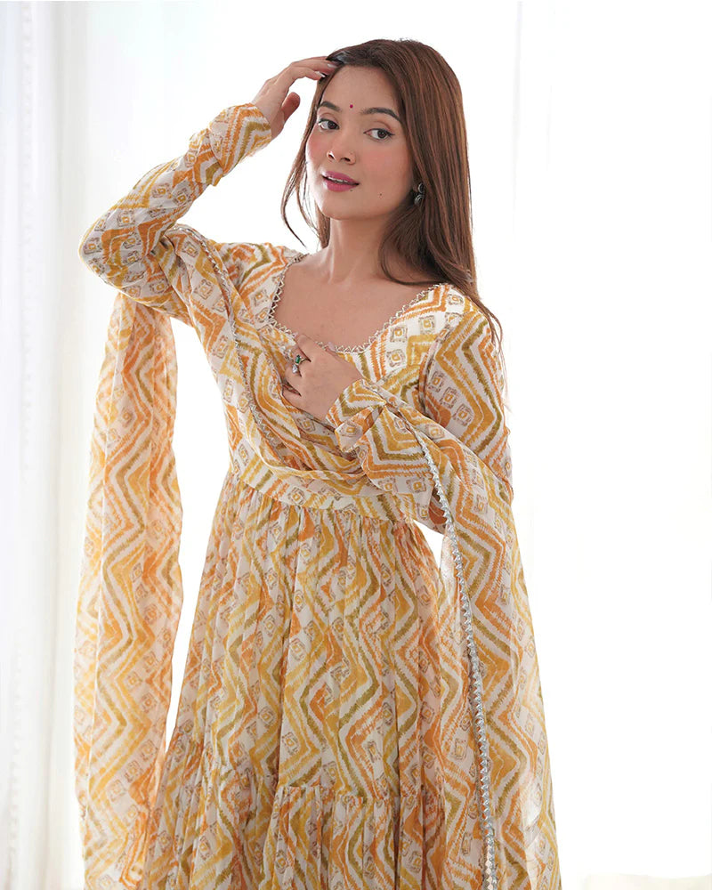 OFF-WHITE COLOR SOFT GEORGETTE THREE LAYER RUFFLE STYLE ANARKALI SUIT
