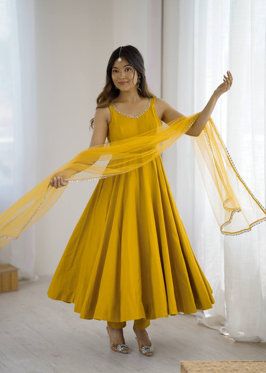 YELLOW COLOR PURE ROMANSILK CHANDERI FABRIC BASE FULLY FLAIR ANARKALI SUIT SET OF 3