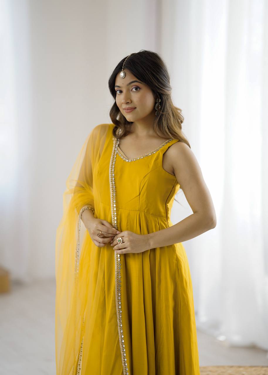 YELLOW COLOR PURE ROMANSILK CHANDERI FABRIC BASE FULLY FLAIR ANARKALI SUIT SET OF 3