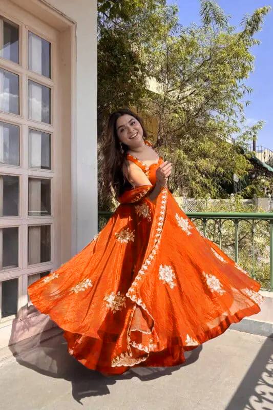 ORANGE DESIGNER ANARKALI WITH SABYASACHI STYLE NECKLINE
