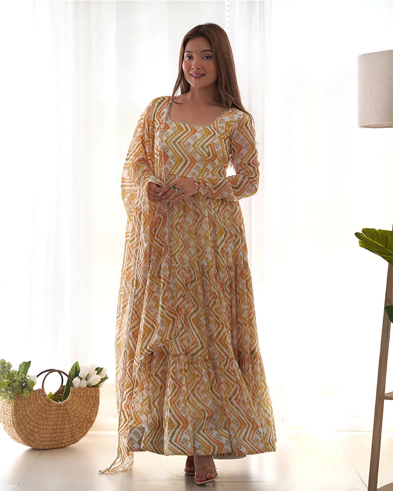 OFF-WHITE COLOR SOFT GEORGETTE THREE LAYER RUFFLE STYLE ANARKALI SUIT