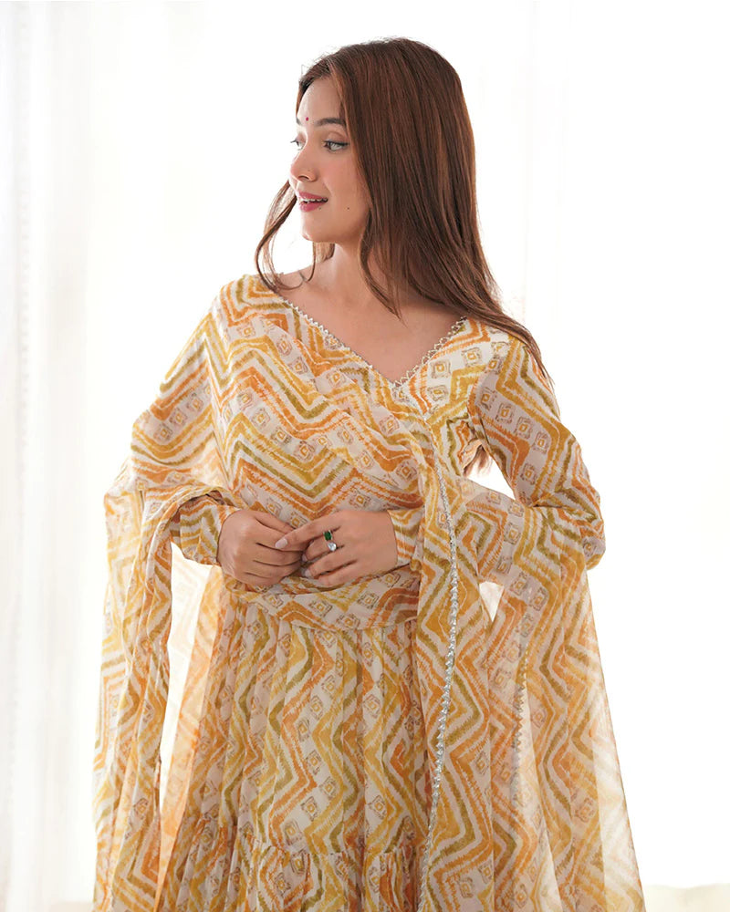 OFF-WHITE COLOR SOFT GEORGETTE THREE LAYER RUFFLE STYLE ANARKALI SUIT