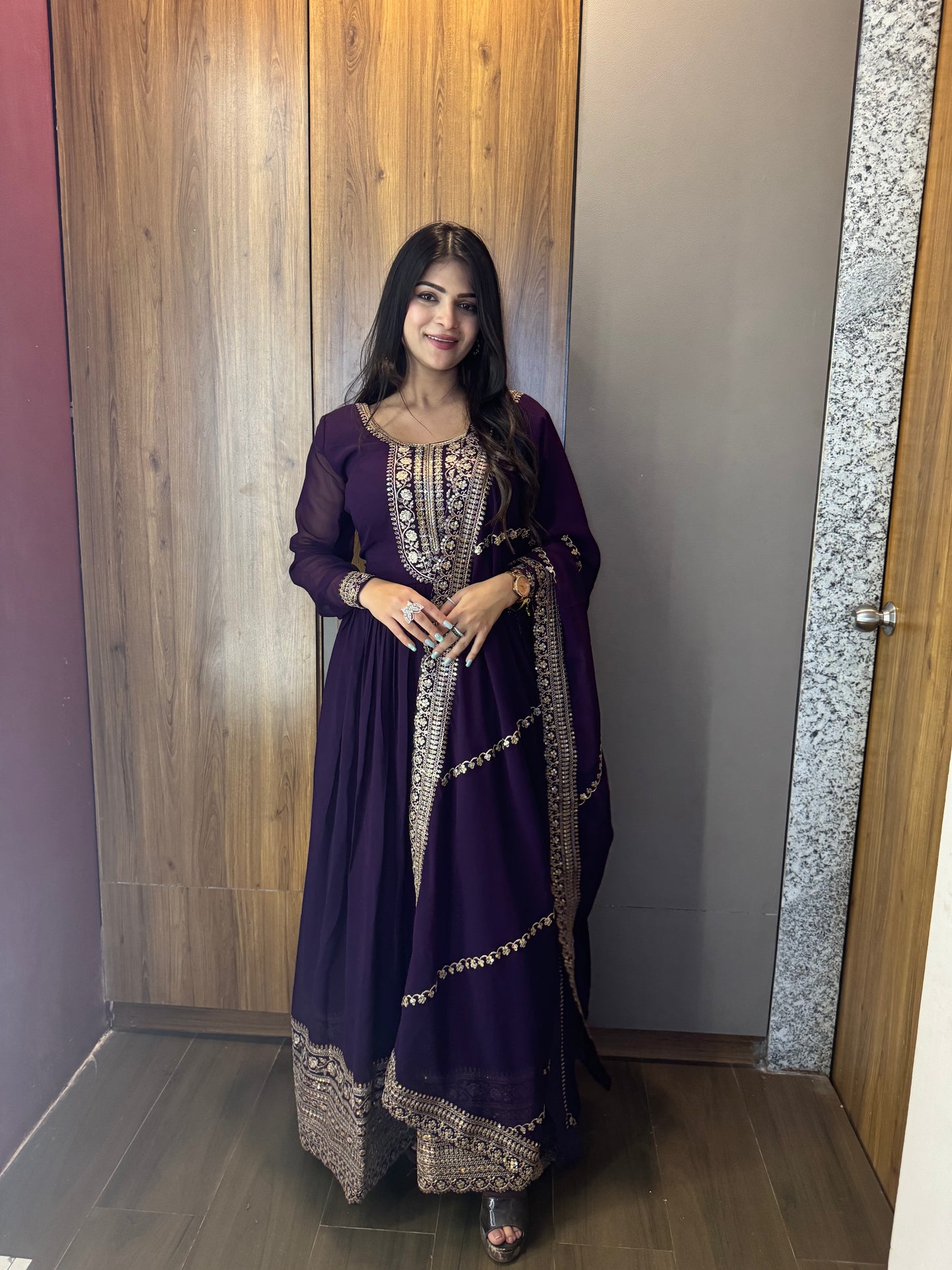 VISHWA PANDYA IN PURPLE COLOR FAUX BLOOMING RICH SEQUENCE EMBROIDERED GOWN