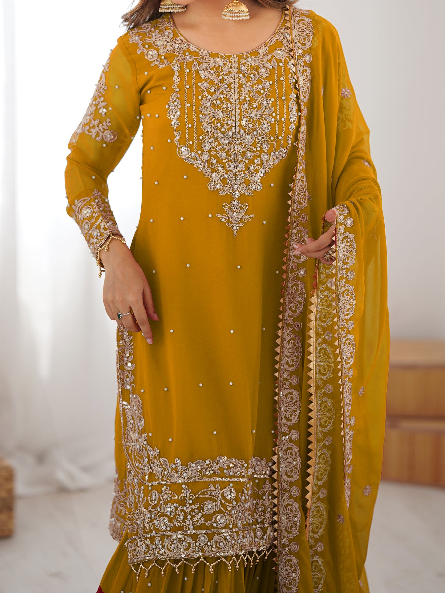 MUSTARD COLOR FAUX GEORGETTE FABRIC SEQUENCE AND THREAD WITH PEARL WORK SHARARA SET