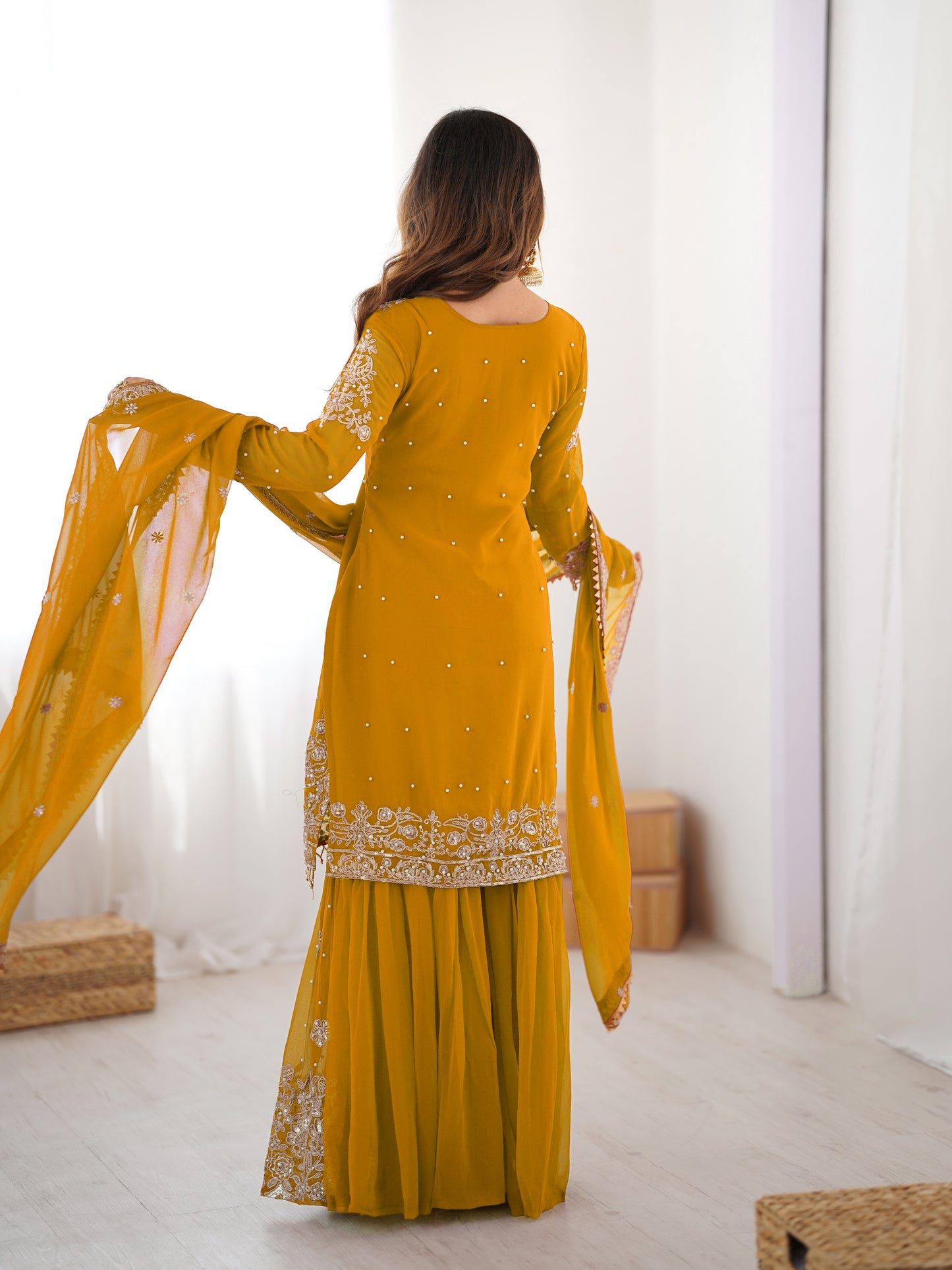 MUSTARD COLOR FAUX GEORGETTE FABRIC SEQUENCE AND THREAD WITH PEARL WORK SHARARA SET