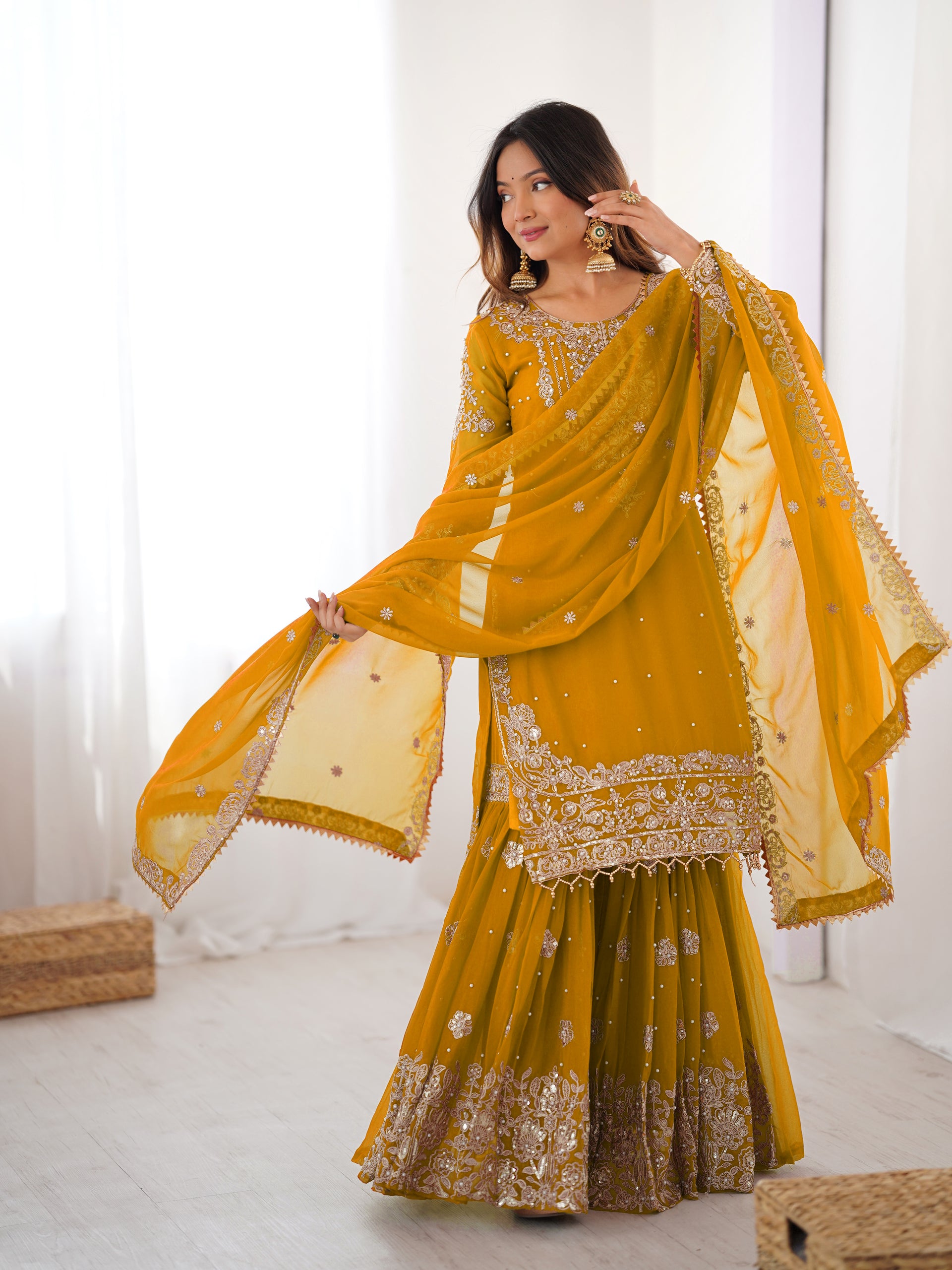 MUSTARD COLOR FAUX GEORGETTE FABRIC SEQUENCE AND THREAD WITH PEARL WORK SHARARA SET