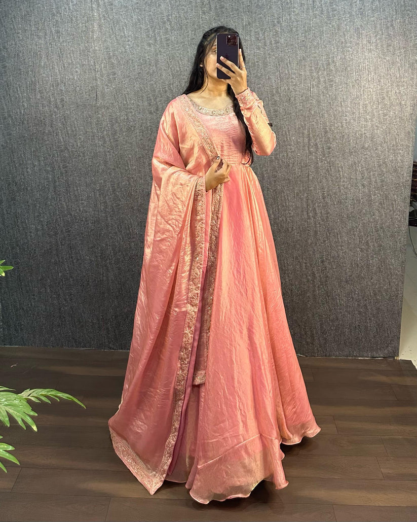 PEACH COLOR HEAVY FANDY SILK WITH EMBROIDERY SEQUENCE WORK